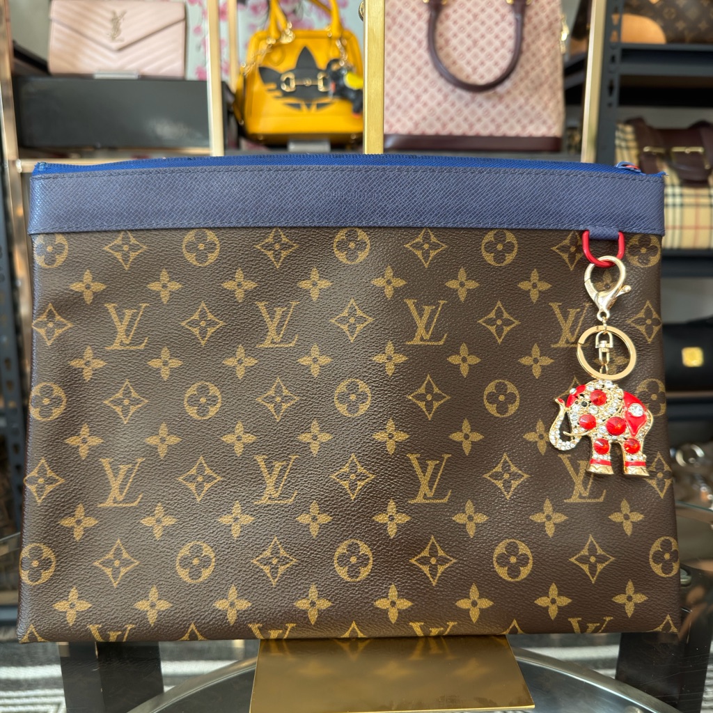 Louis Vuitton Monogram Canvas Pouch With Navy Trim And Red Charm